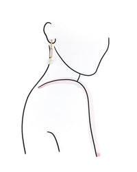 Earring on a mannequin with a white background