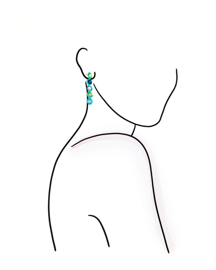 Black line drawing of a dress with colorful beads on a white background