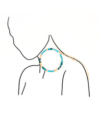Necklace with multicolored beads on a white background