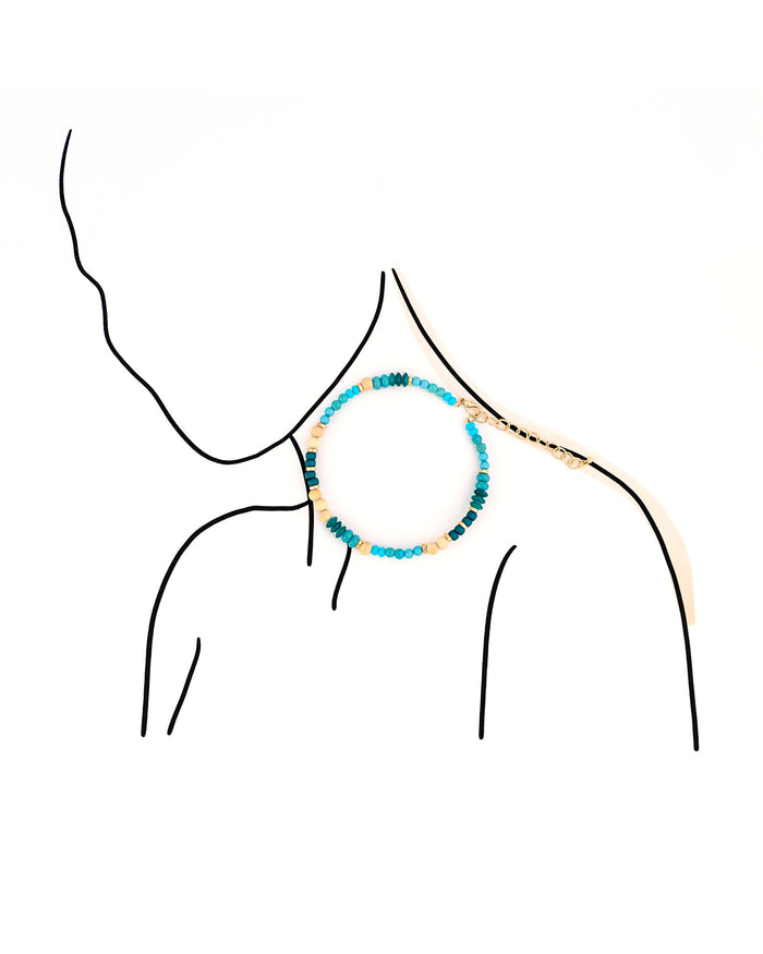 Necklace with multicolored beads on a white background