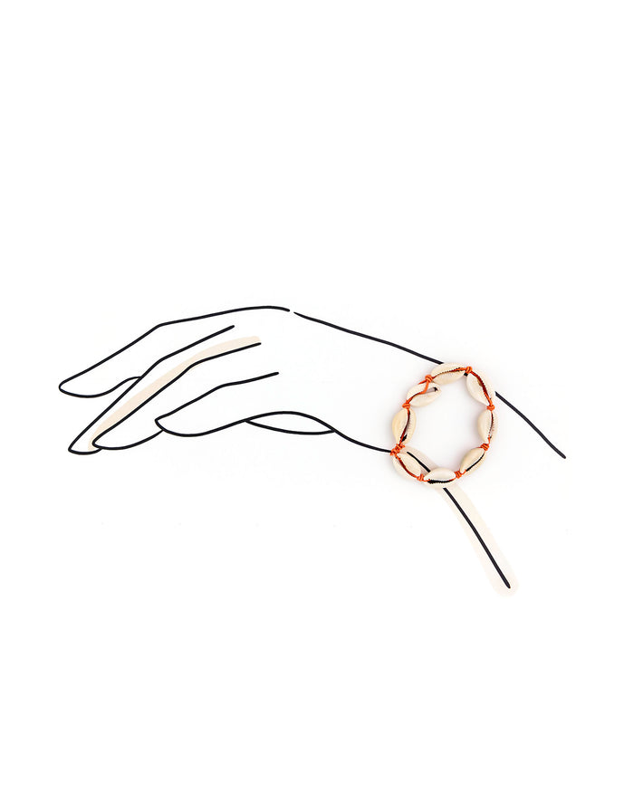 Simplified line drawing of a hand wearing a shell bracelet on a white background