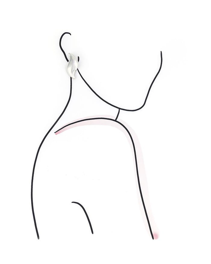 model outline wearing silver S-shaped earrings