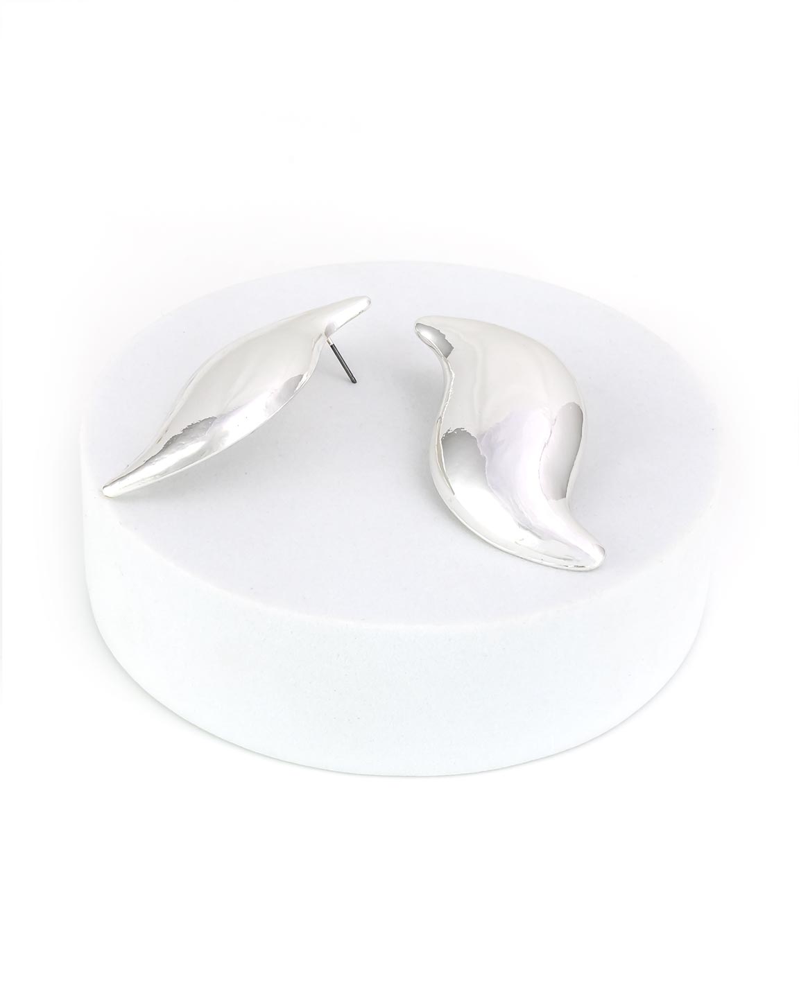Pair of silver drop S-shaped earrings on a white background