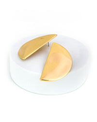 Gold half-circle earrings on a white background