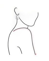 Model outline wearing silver hoop earrings