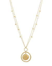 Golden Serenity Orbital Shell Necklace displayed on white background – Dauplaise Jewelry