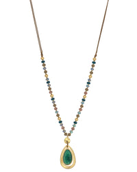 Emerald Orbit Elegance displayed on white background – Dauplaise Jewelry