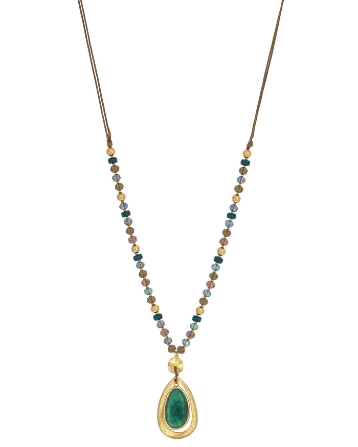 Emerald Orbit Elegance displayed on white background – Dauplaise Jewelry