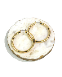 Classic medium-sized gold-tone hoop earrings – Dauplaise Jewelry