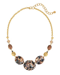 Golden Chain Necklace with Marbled Lucite Discs displayed on white background – Dauplaise Jewelry