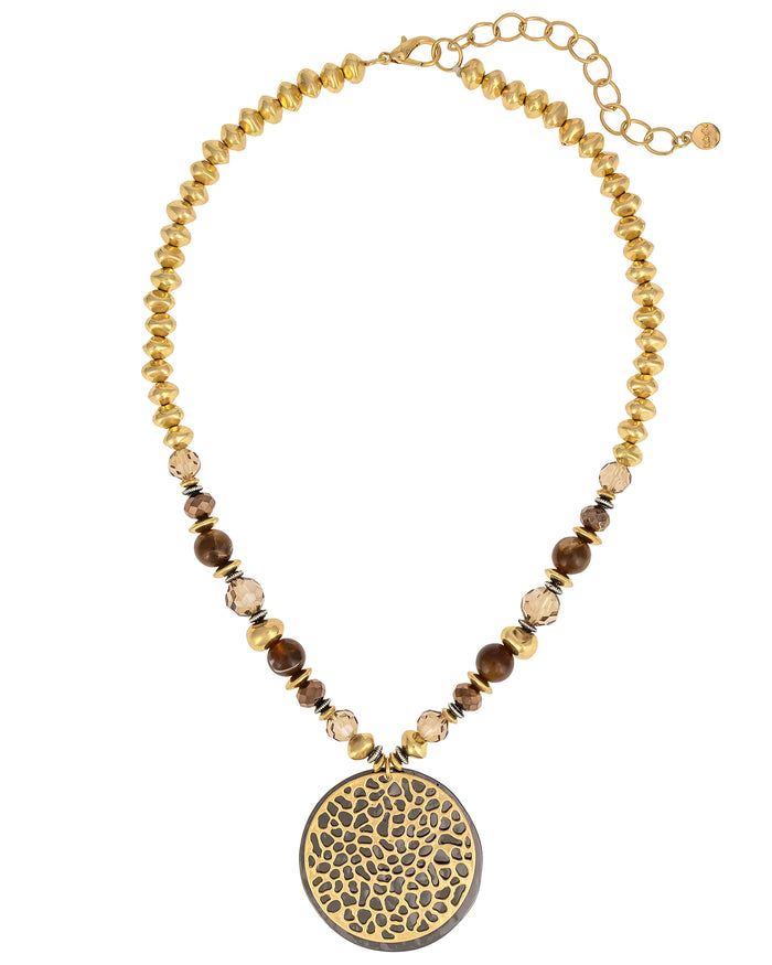 Golden Earth Statement Necklace with Circular Pendant displayed on white background – Dauplaise Jewelry