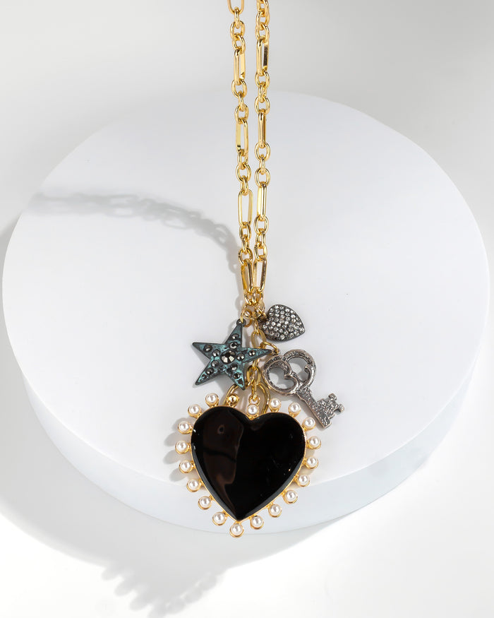 Upcycled Heart + Key Charmed Necklace displayed on white background – Dauplaise Jewelry