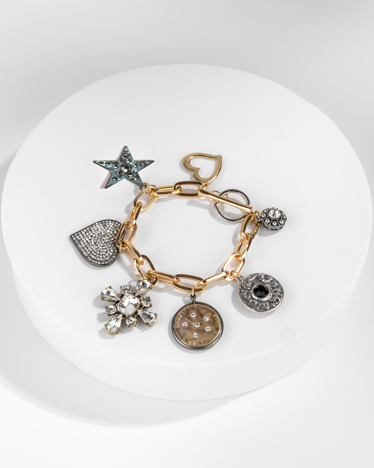 Upcycled Charm Bracelet displayed on white background – Dauplaise Jewelry