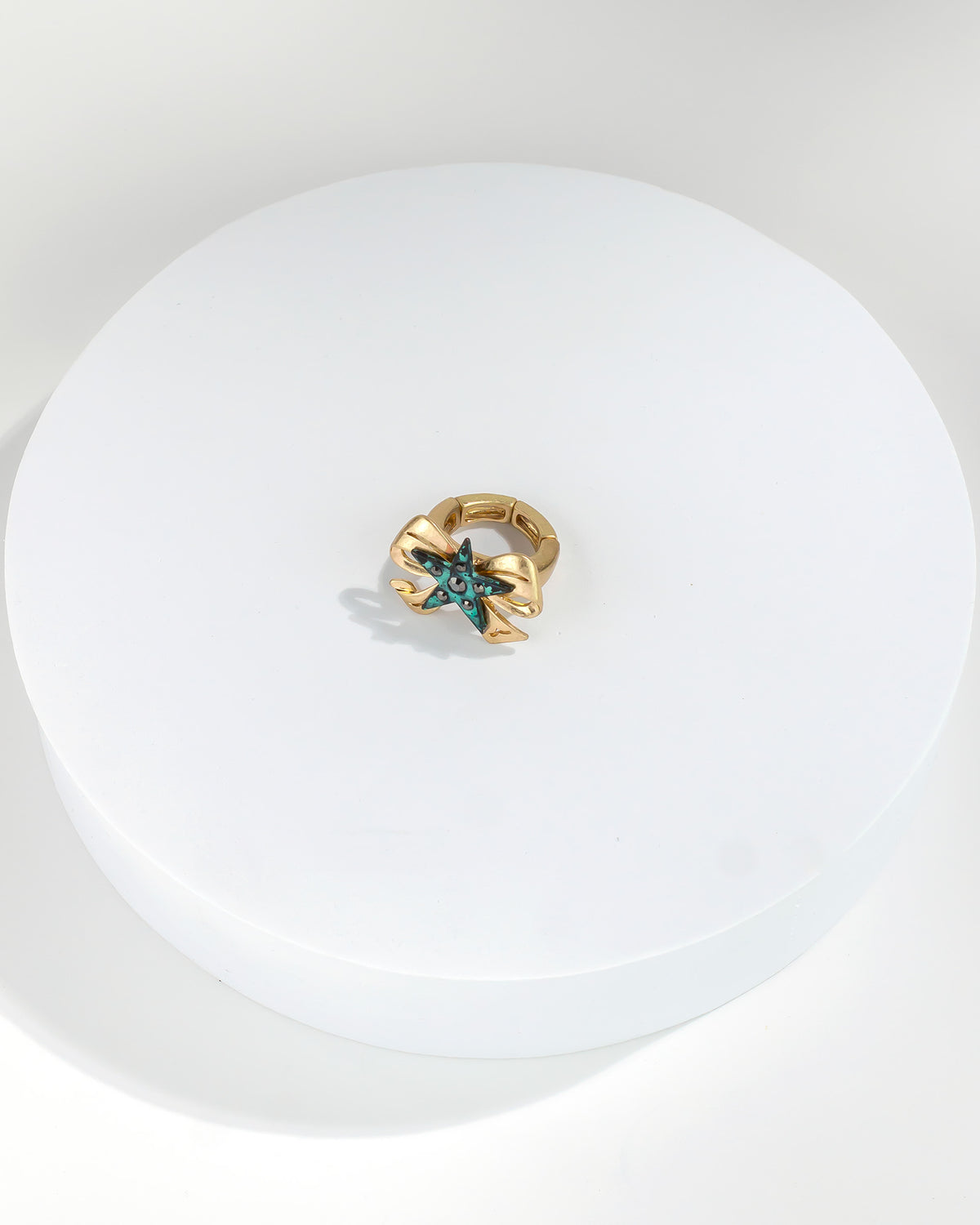 Upcycled Bow Ring with Star Charm displayed on white background – Dauplaise Jewelry