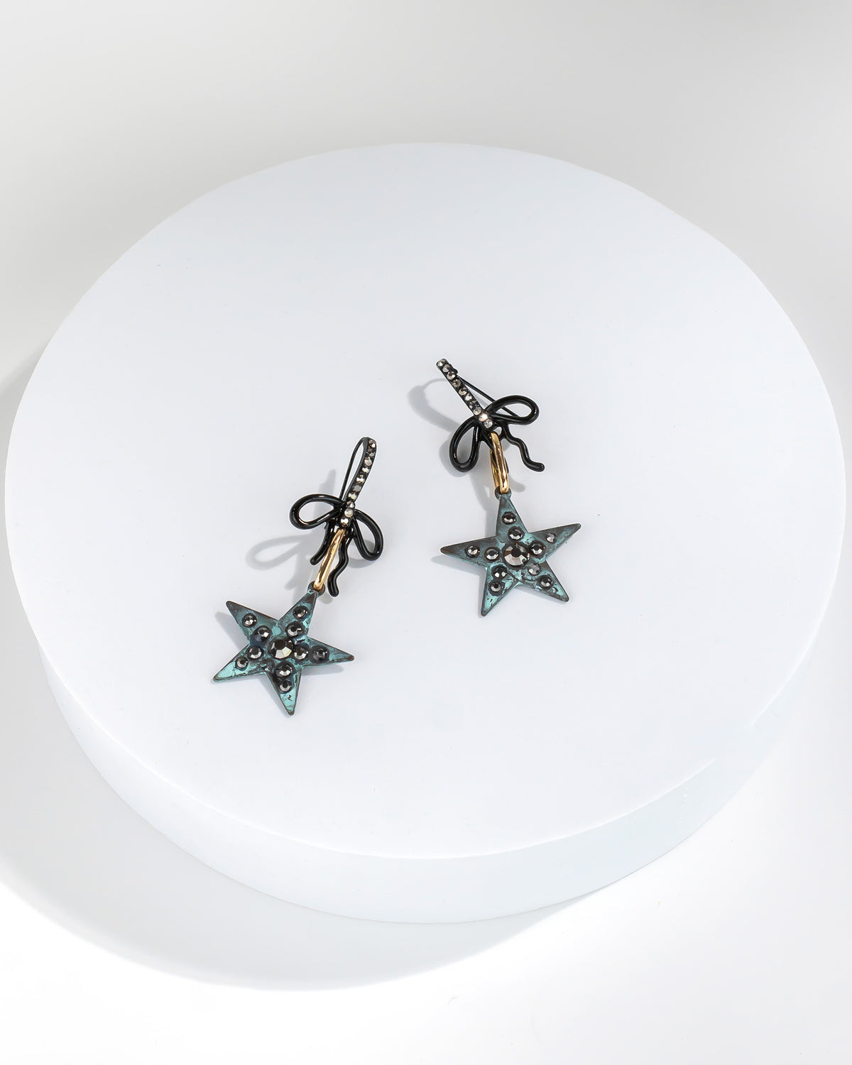 Upcycled Star Charm Drop Earrings displayed on white background – Dauplaise Jewelry