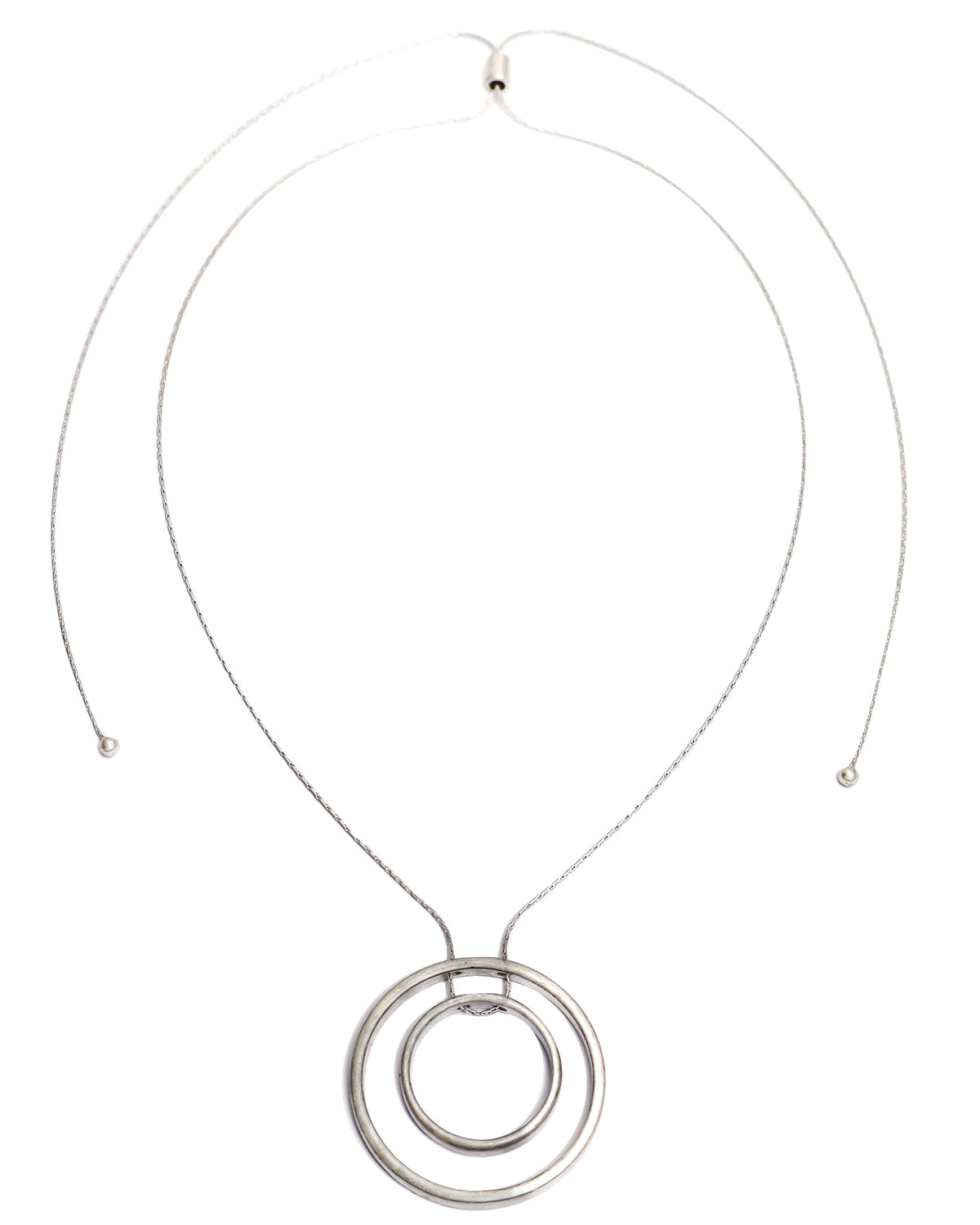 Long Silver-tone metal pendant displayed on white background – Dauplaise Jewelry