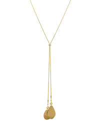 Worn-gold adjustable lariat necklace with two organic teardrop pendants on a white background.