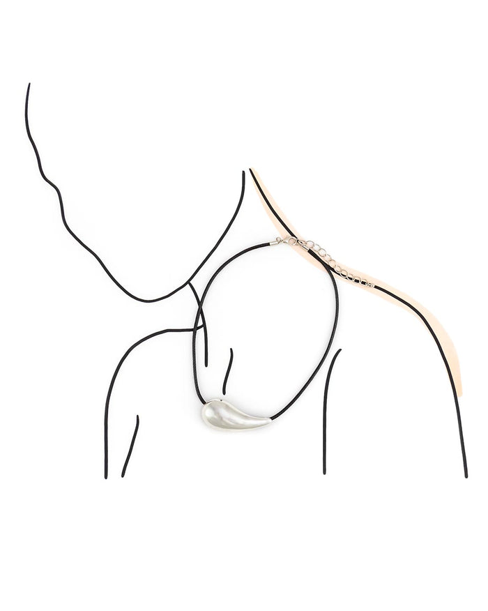 Minimalist necklace on a model outline