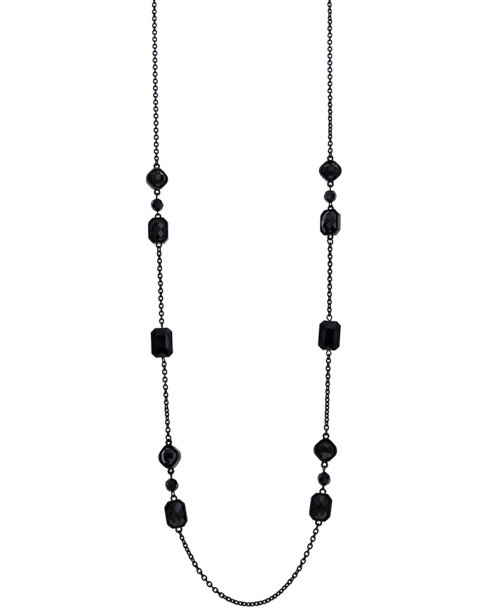 Black beaded necklace on a white background