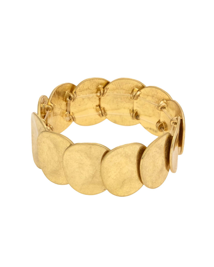 Worn-gold stretch bracelet with overlapping hammered round discs on a white background.