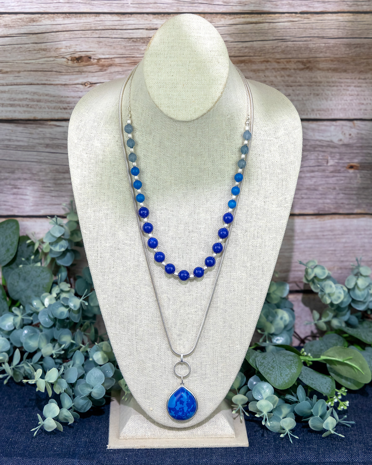 Layered Blue Beaded Necklace with Teardrop Pendant