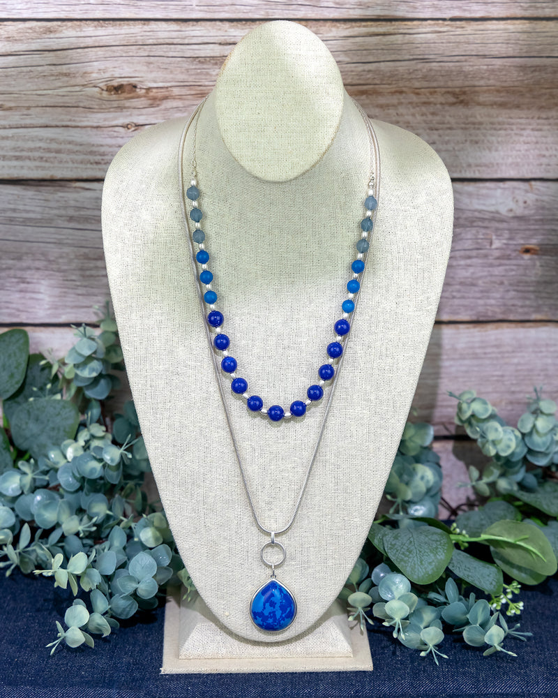 Layered Blue Beaded Necklace with Teardrop Pendant