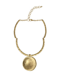 Gold necklace with a round pendant on a white background