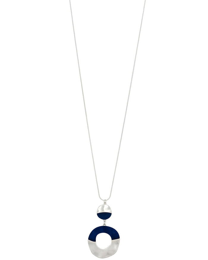 Long blue and worn-silver double-disc pendant necklace with linked round forms on a white background.