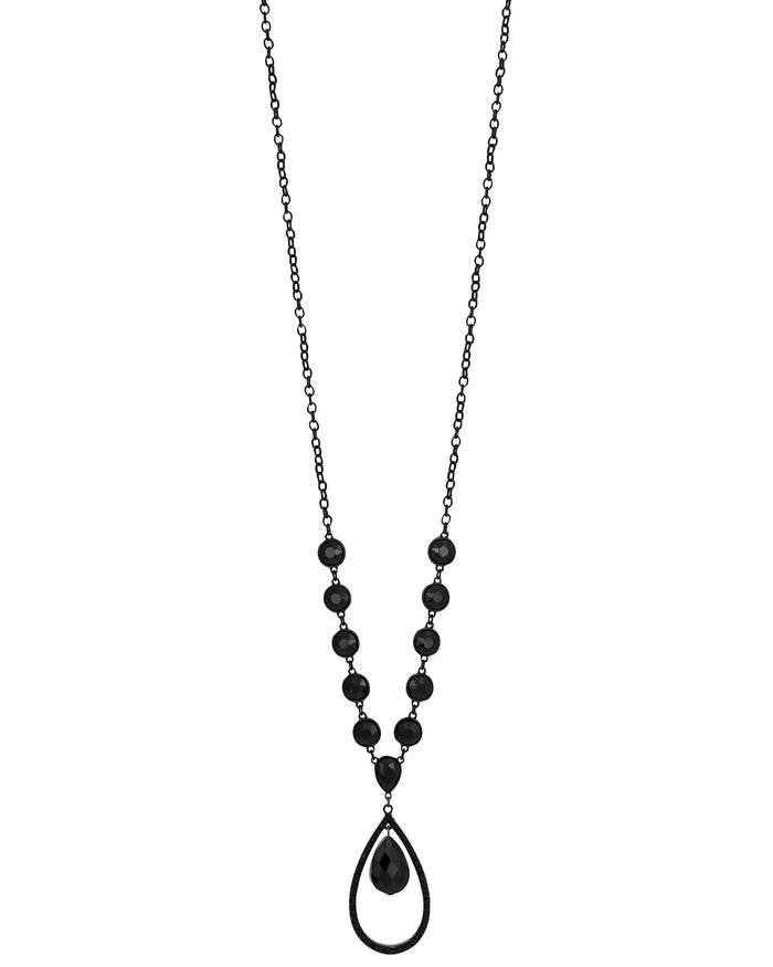 Long jet-black orbital teardrop pendant necklace with faceted accents on a white background.