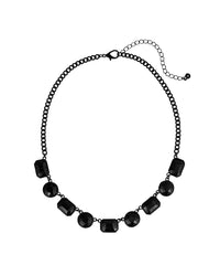 Short jet-black frontal necklace with alternating rectangular and round faceted accents on a white background.