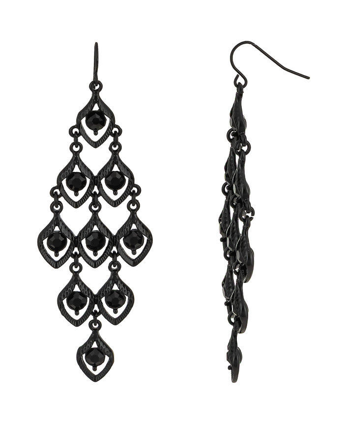 Jet-black kite chandelier French-wire earrings with faceted black beads on a white background.