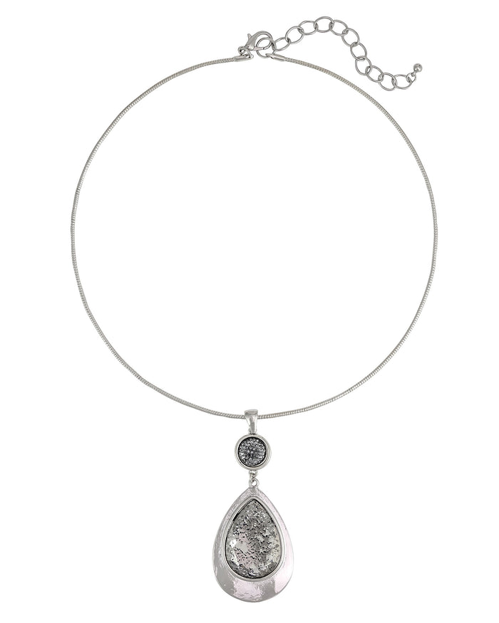 Necklace with a teardrop-shaped pendant on a white background