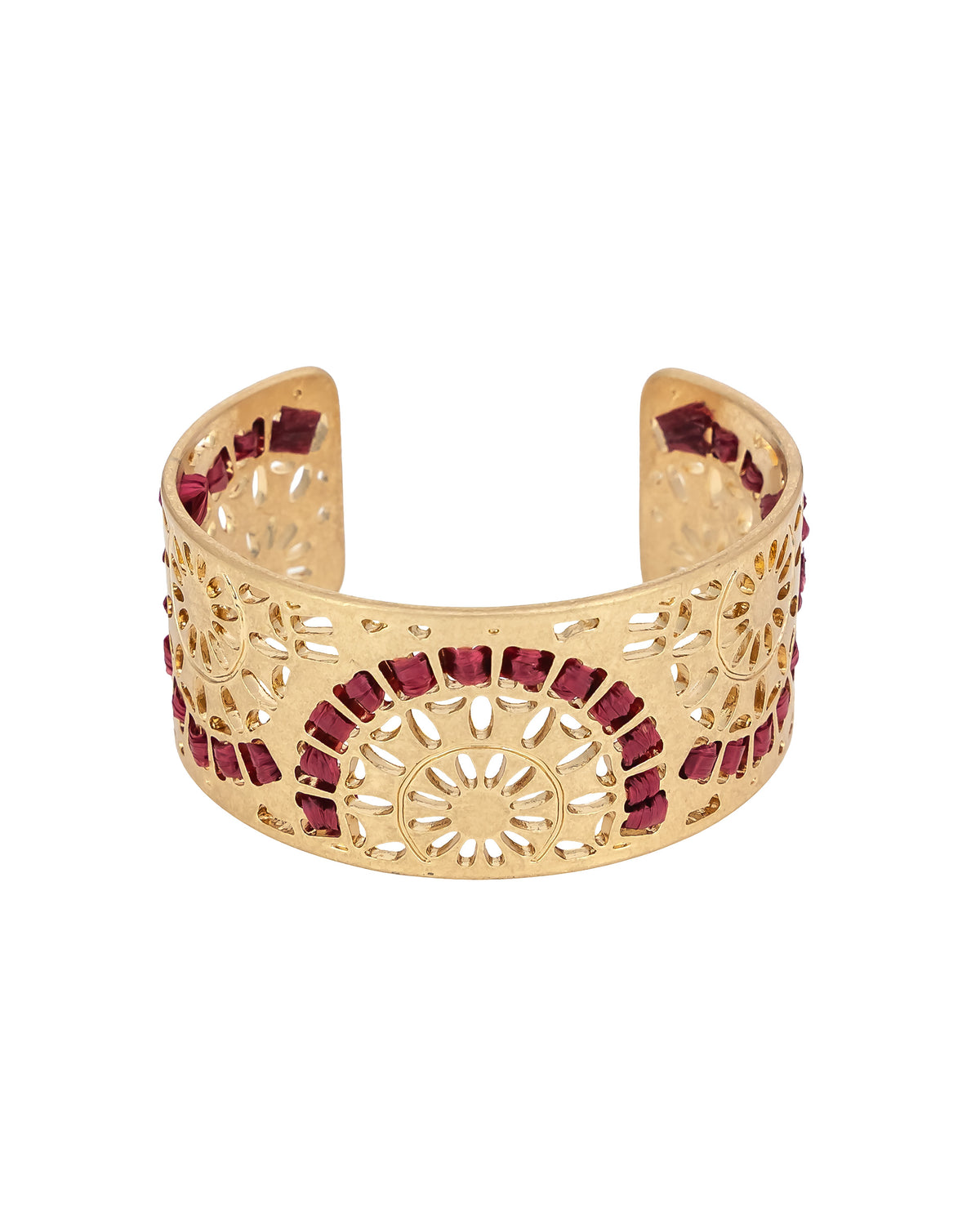 Gold bracelet with red wrapping on a white background