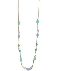 Necklace with blue and green beads on a white background