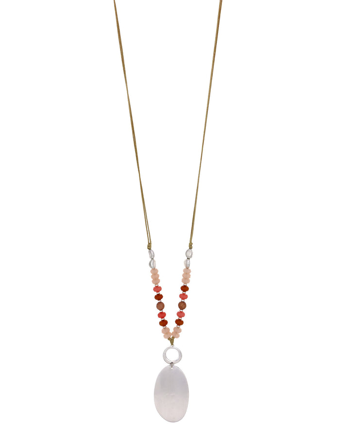 Necklace with beads and a large white pendant on a white background