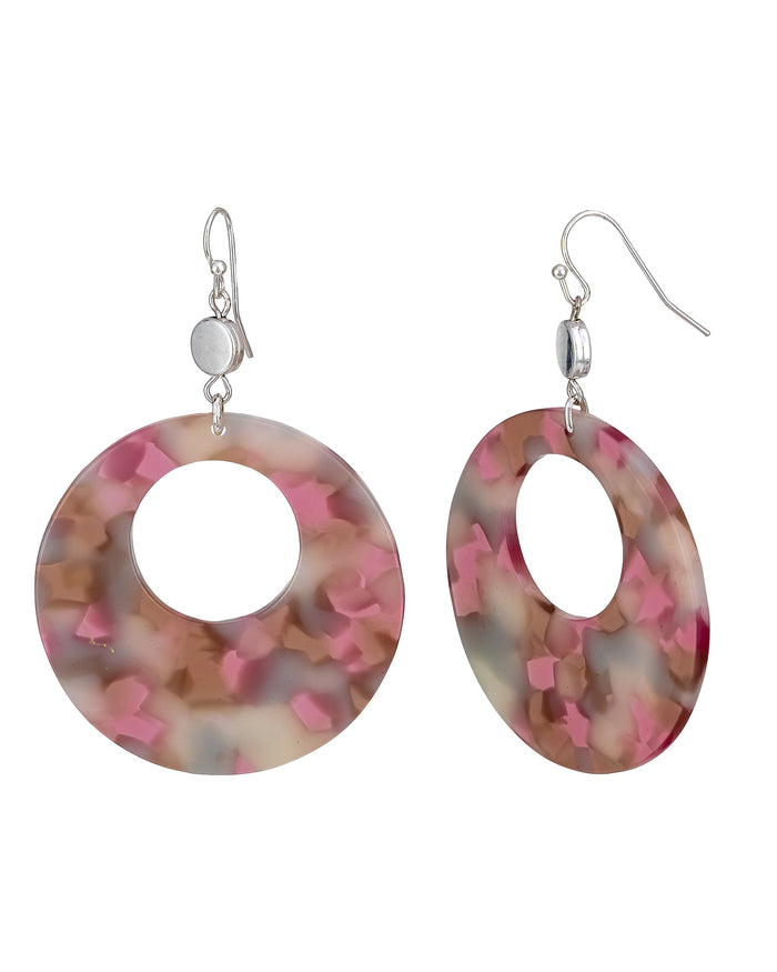 Pair of earrings with pink and brown circular design on a white background