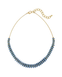 Necklace with blue beads and gold chain on a white background