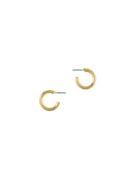 Polished gold-tone sculptural C-hoop post earrings with a recessed center detail on a white background.