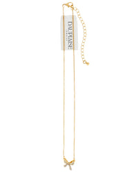A delicate gold chain necklace with a bow charm embellished with small clear rhinestones, hanging from a white paper tag that reads 'DAUPHISE'.