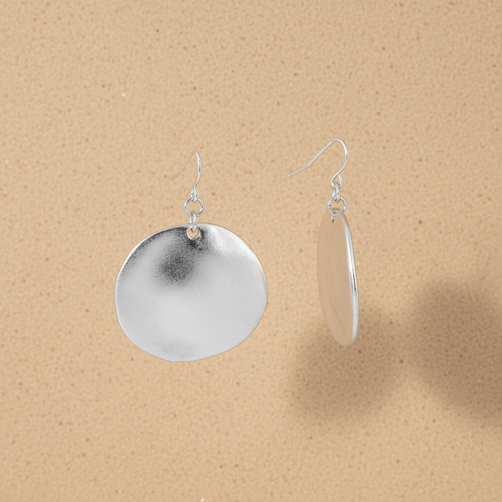 Silver Disc Drop Earrings lifestyle shot – negative space